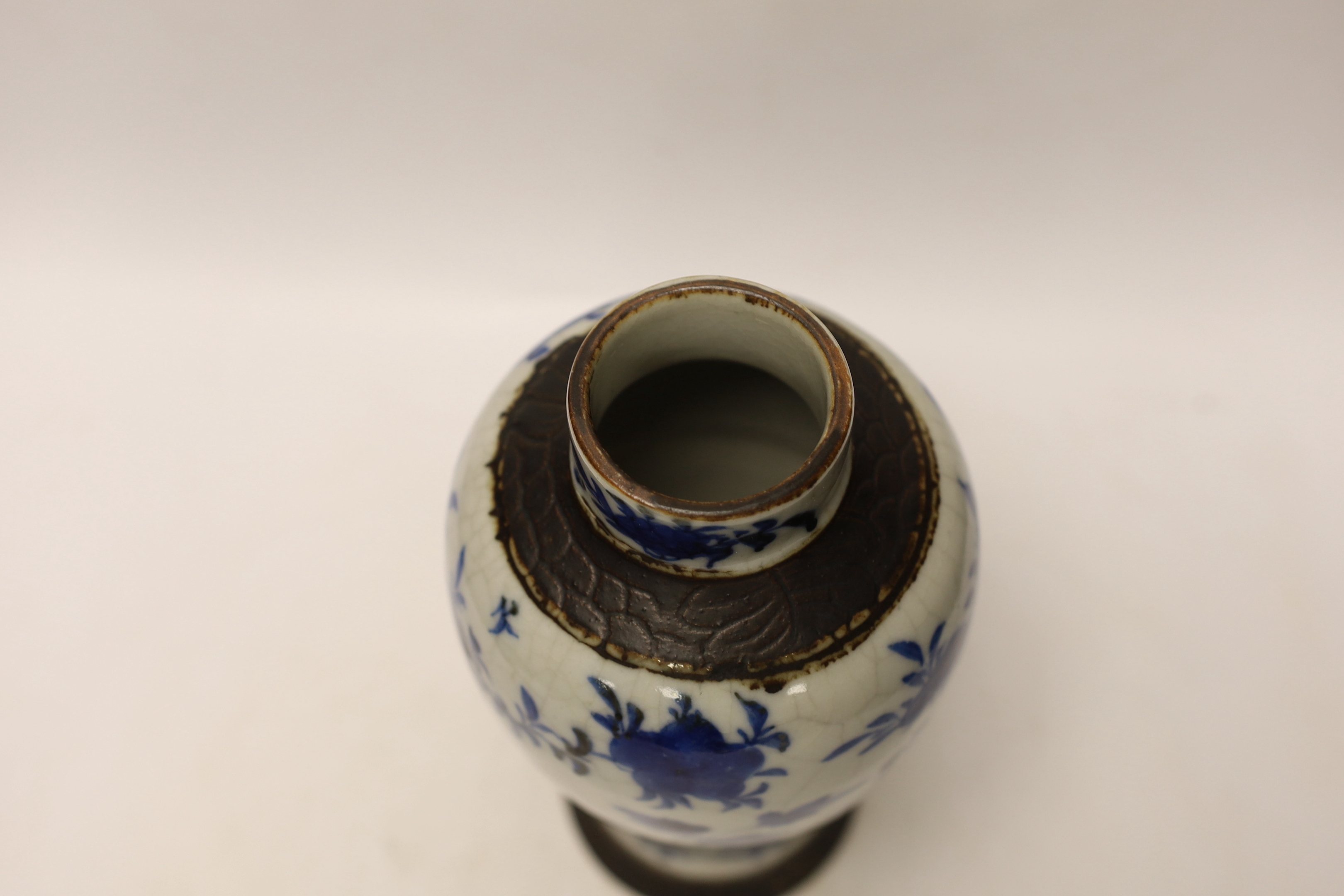 A late 19th century Chinese crackle glaze vase and cover, 30cm